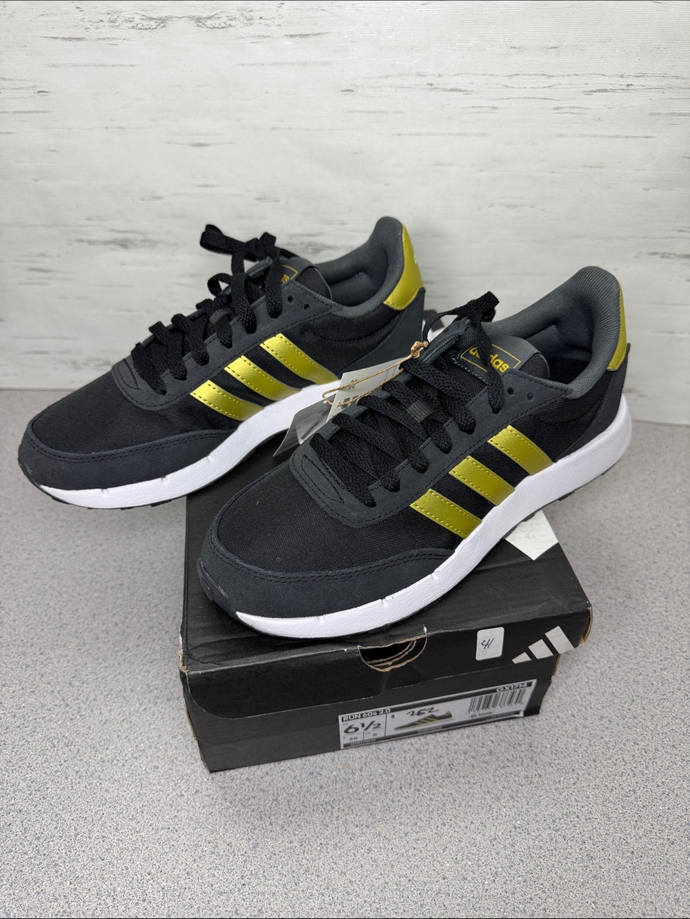 adidas Black Sneakers with Metallic Gold Stripes